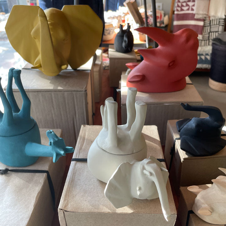Color wooden animal heads and pots